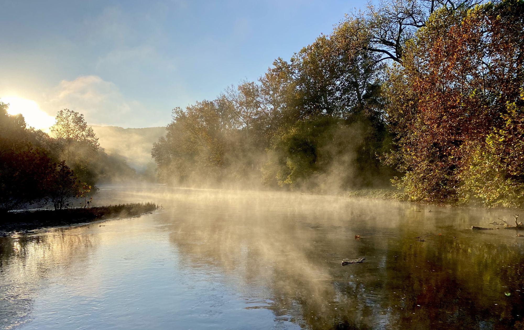 Sunrise mist rising off the North Fork of the Shenandoah River at Seven Bends State Park