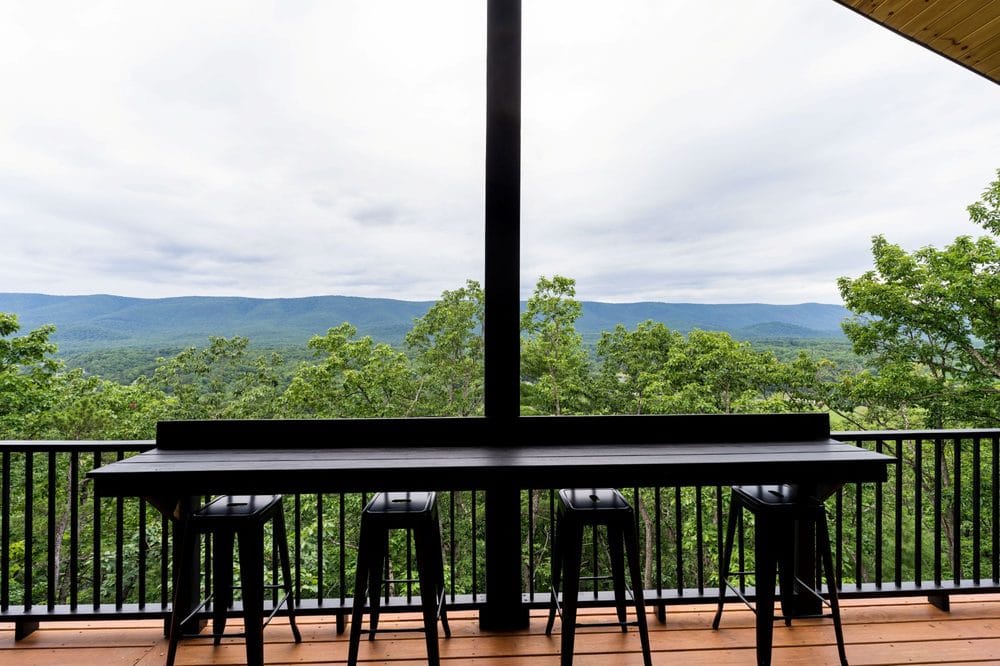 Covered deck with a valley view